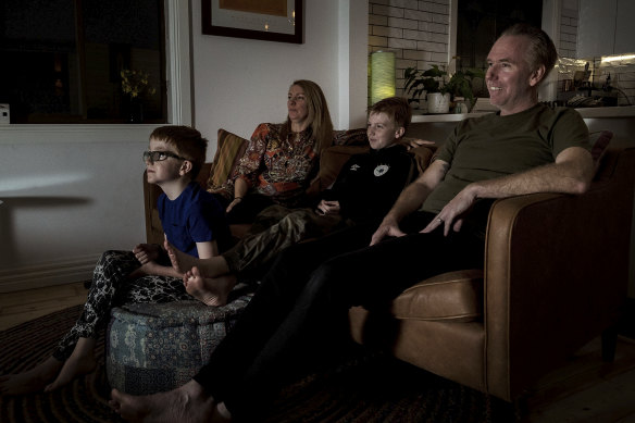 Glued to the screen: Zoe Shurgold and Paul McAleer with sons Dylan, 10, and Myles, seven.