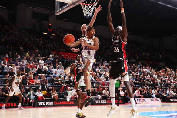 Sydney Kings’ Jaylen Adams drives at the basket against Illawarra.