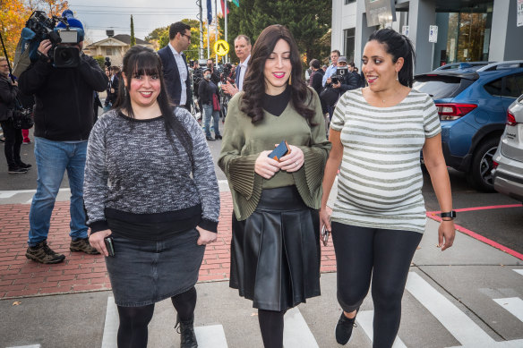 Elly Sapper, Dassi Erlich and Nicole Meyer arrive at a press conference after the news that an extradition hearing date has been set for alleged sexual abuser Malka Leifer.