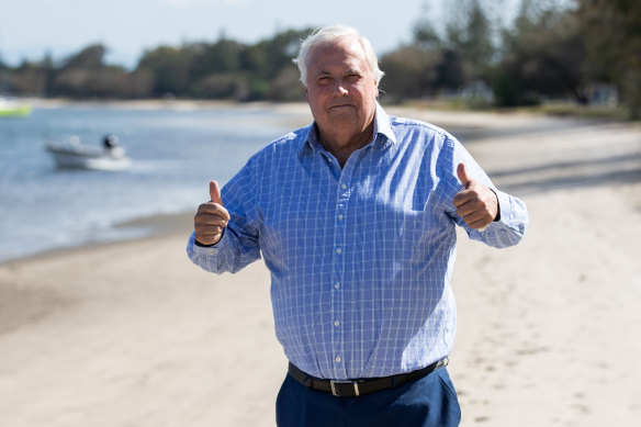 The Electoral Commission of Queensland has taken businessman and former MP Clive Palmer to court to determine whether he is a property developer.