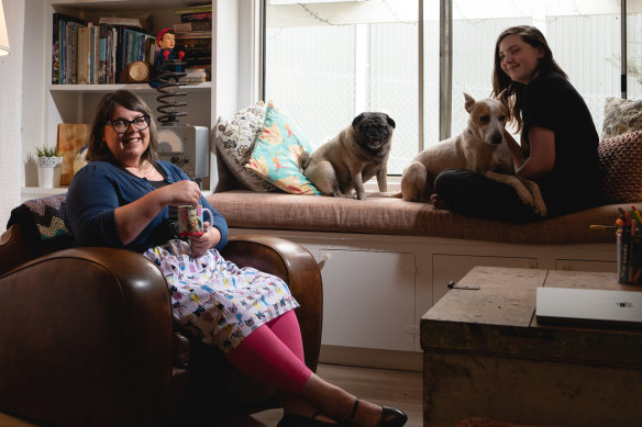 Kara Cooper with daughter Theodora,  13, and dogs Badger and Andy.