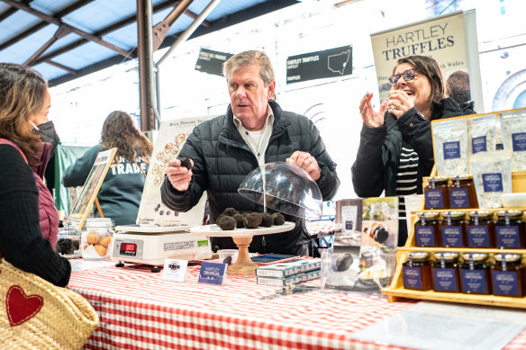 Richard and Jane Austin selling truffles from their farm at the Carriageworks Farmers market.