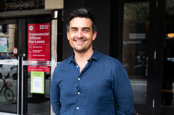 Alex McCauley, chief executive officer of StartupAus, outside the office he rents with friends. 