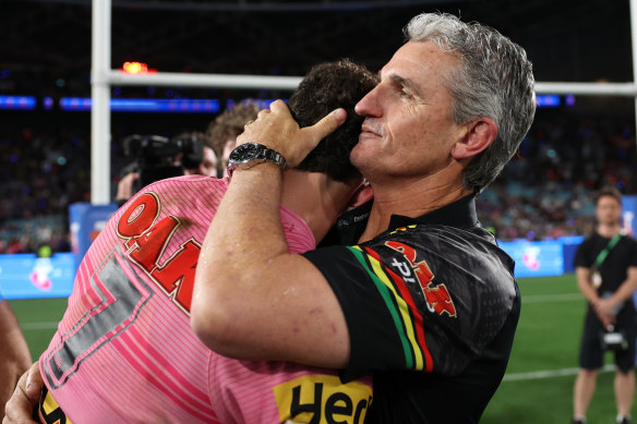 Father and son Nathan and Ivan Cleary celebrate a fourth premiership together in 2024.
