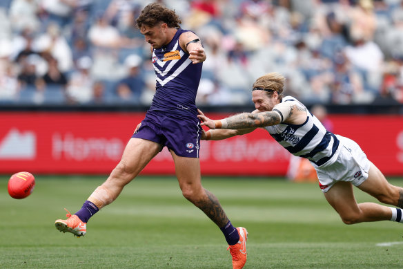 Tom Stewart gets a grip on Luke Jackson.