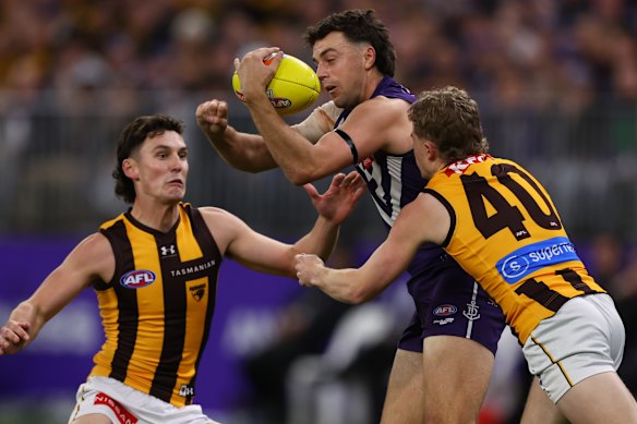 Jordan Clark of the Dockers controls the ball.