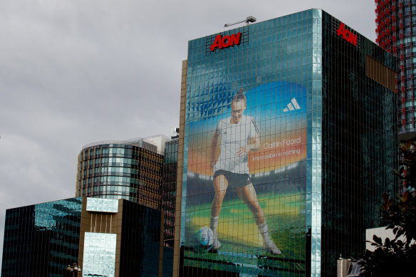 Caitlin Foord’s image looms larger than life on the side of a Kent Street office tower.