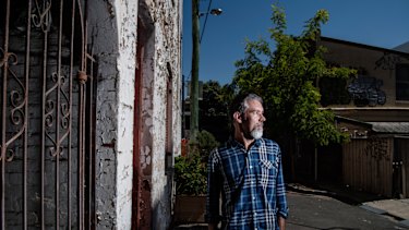 Mark Delaney (pictured) and his son Tom wrote a book about climate change which draws on their experiences living in Indian slums 
