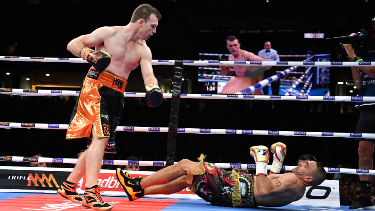 Next generation: Jeff Horn stands over Anthony Mundine as he hits the canvas.