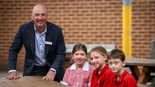Chelsea Heights Primary School principal Steven Capp with students (from left) Bronte, Billie and Lewis.