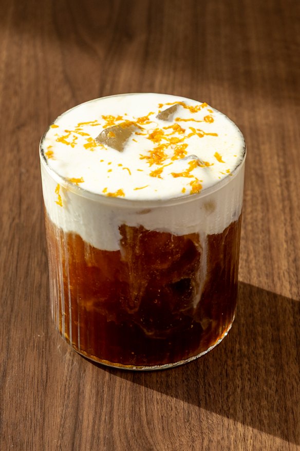 Cold brew, creamy coconut float and orange zest.