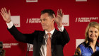 Labor leader Chris Minns and his wife, Anna, at a reception at the Novotel Hotel in Brighton-Le-Sands, Sydney, after winning the NSW state election.