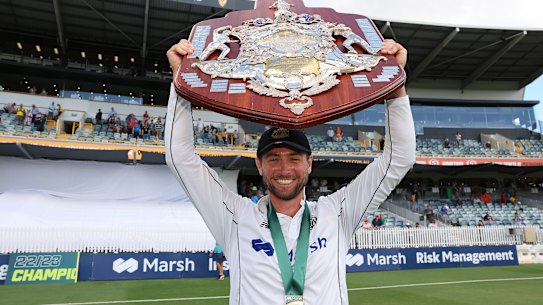 Western Australia captain Sam Whiteman holds the Sheffield Shield aloft after Sunday’s convincing win over Victoria.