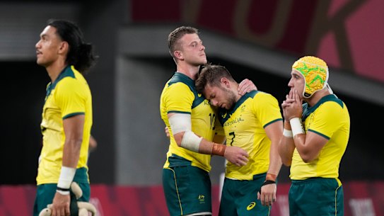 All members of Australia’s men’s rugby sevens team have been reprimanded for their behaviour on a flight home from Japan. 