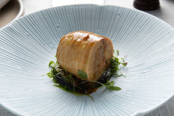 The glistening chicken ballotine is a stunning feat of technique and creativity.