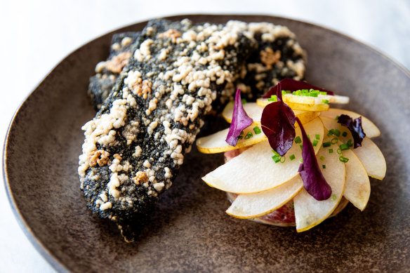 Beef tartare with fermented chilli mayo, fermented daikon and nashi.