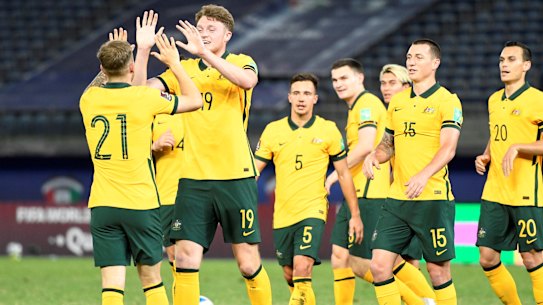 Harry Souttar, second from left, has backed the depth of the Socceroos squad preparing to face Vietnam.
