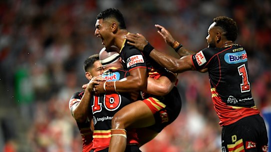 Isaiya Katoa celebrates Mark Nicholls’ try.