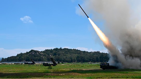 In this photo released by China’s Xinhua News Agency, a projectile is launched from an unspecified location in China during long-range live-fire drills on Thursday.
