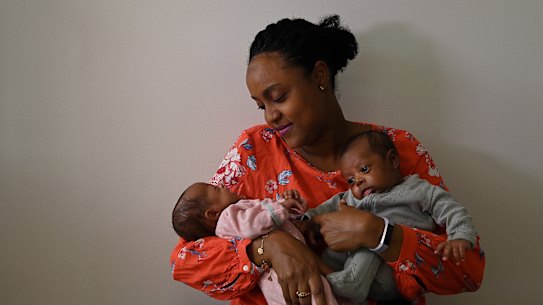 Lobaba Idris (centre) with her 6 week old twins Lalya Badri (left) and Zayn Badri (right) at their home in Roseville, Sydney, NSW. 12th March, 2021. Photo: Kate Geraghty