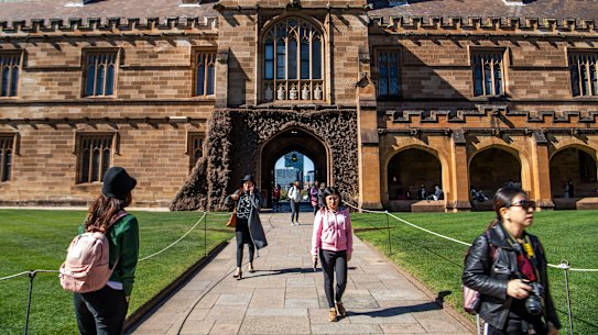 Students at the quadrangle building at the University of Sydney.