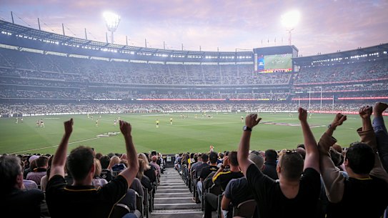 Fans still need to scan QR codes to go to the football despite its reduced effect in contact tracing.