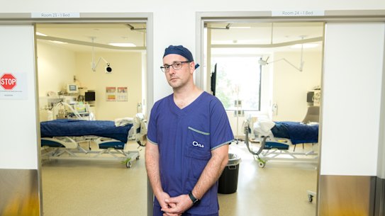 Associate Professor David Brewster, intensive care deputy director, outside two of the new intensive care rooms at  Cabrini hospital.
