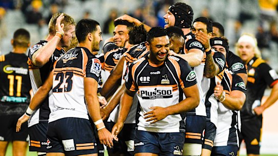 The Brumbies celebrate their big win over the Chiefs.