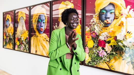 Atong Atem with her self-portrait that won the Art Gallery of NSW’s new La Prairie Art Award. 