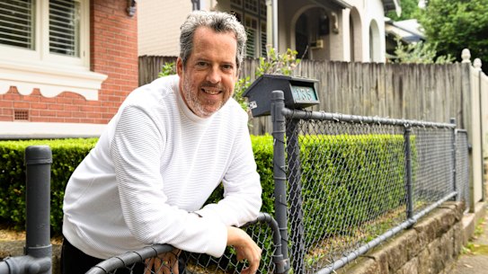 Peter McHenry will no longer need to charge his EV at a shopping centre, thanks to a kerbside charger being installed outside his house.