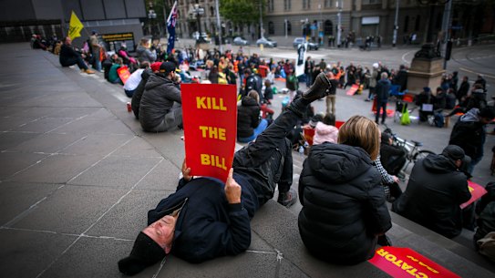 Protesters on the steps of State Parliament on Monday evening.