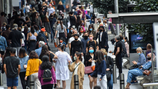 A new normal: Crowds are slowly returning to the CBD.