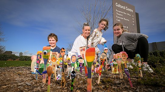 Flynn, Rebecca Ellis, Milla and Ashby take their decorated wooden spoons to a Spoonville at the Cardinia Cultural Centre.