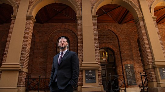 Indigenous barrister Damian Beaufils outside King street court.