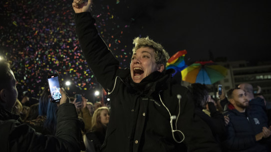 A supporter of the same-sex marriage bill, reacts at Syntagma Square, in Athens, Greece.