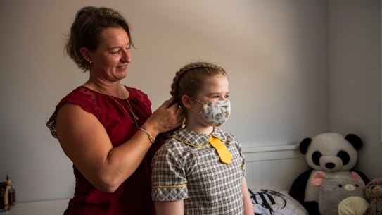Vaccinations and masks may influence how long a student will have to isolate 