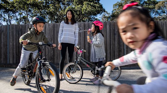 Sarah Du with her children Taylor, Skylar and Riley at their Northmead home.