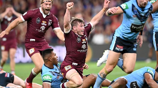 Harry Grant of the Maroons celebrates a try in Origin III.