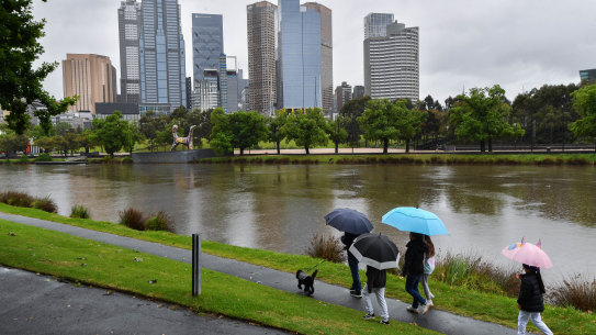 People walking in Melbourne on Saturday.