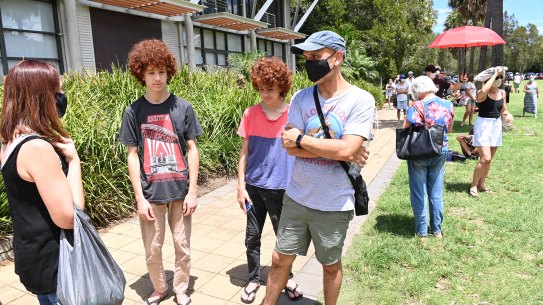 Rebecca and David Roze with boys Noah and Jesse. COVID 19 testing in Avalon after a few new cases have popped up yesterday and today in the Northern Beaches.

