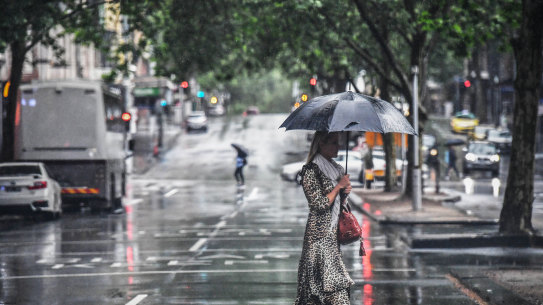 Storm clouds and rain in the city earlier this month. 