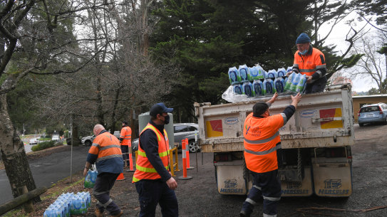 Yarra Valley Water bring in drinking water tanks and bottles for Kallista residents on Wednesday.