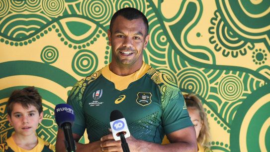 Proud: Kurtley Beale unveils Australia's Indigenous jersey that will be worn against Uruguay at the Rugby World Cup. 
