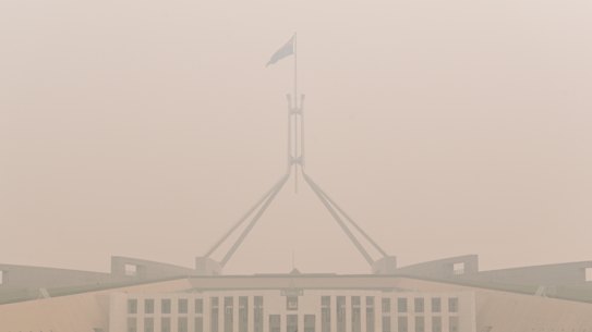 Thick smoke shrouds Parliament House in Canberra on New Year's Day.