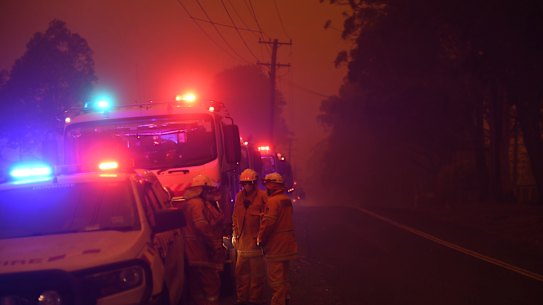Dense smoke west of Nowra as the southerly change moves through on Saturday evening.
