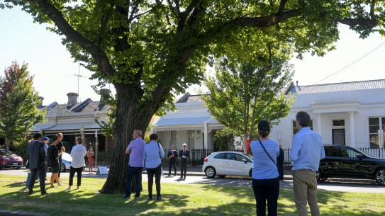 Public auctions often draw keen interest from the neighbours. 