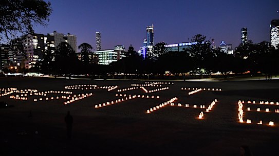 'I can't breathe' spelt out in candles at Musgrave Park.