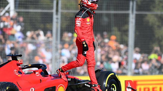 Last year’s winner Charles Leclerc climbs from his Ferrari after retiring from the F1 Grand Prix of Australia.