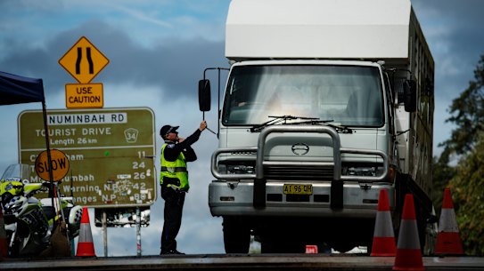 Drivers stopped stopped by police at the Queensland - NSW border checkpoint in the Gold Coast hinterland. 
