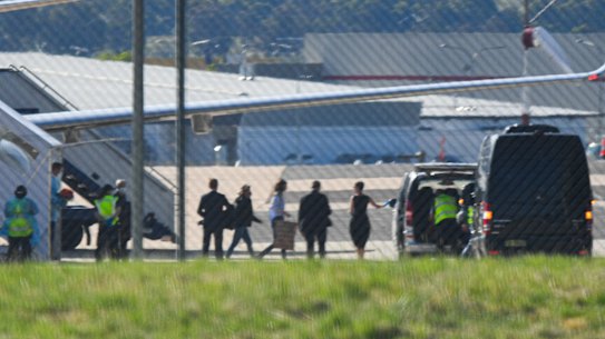 Dr Kylie Moore-Gilbert disembarks an Australian government jet at Canberra Airport.